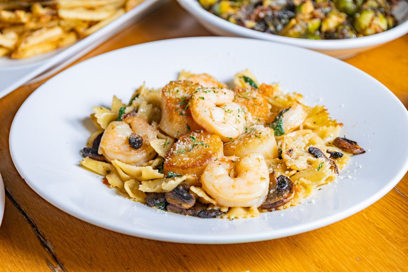 Seafood Florentine with shrimp, scallops and bowtie pasta