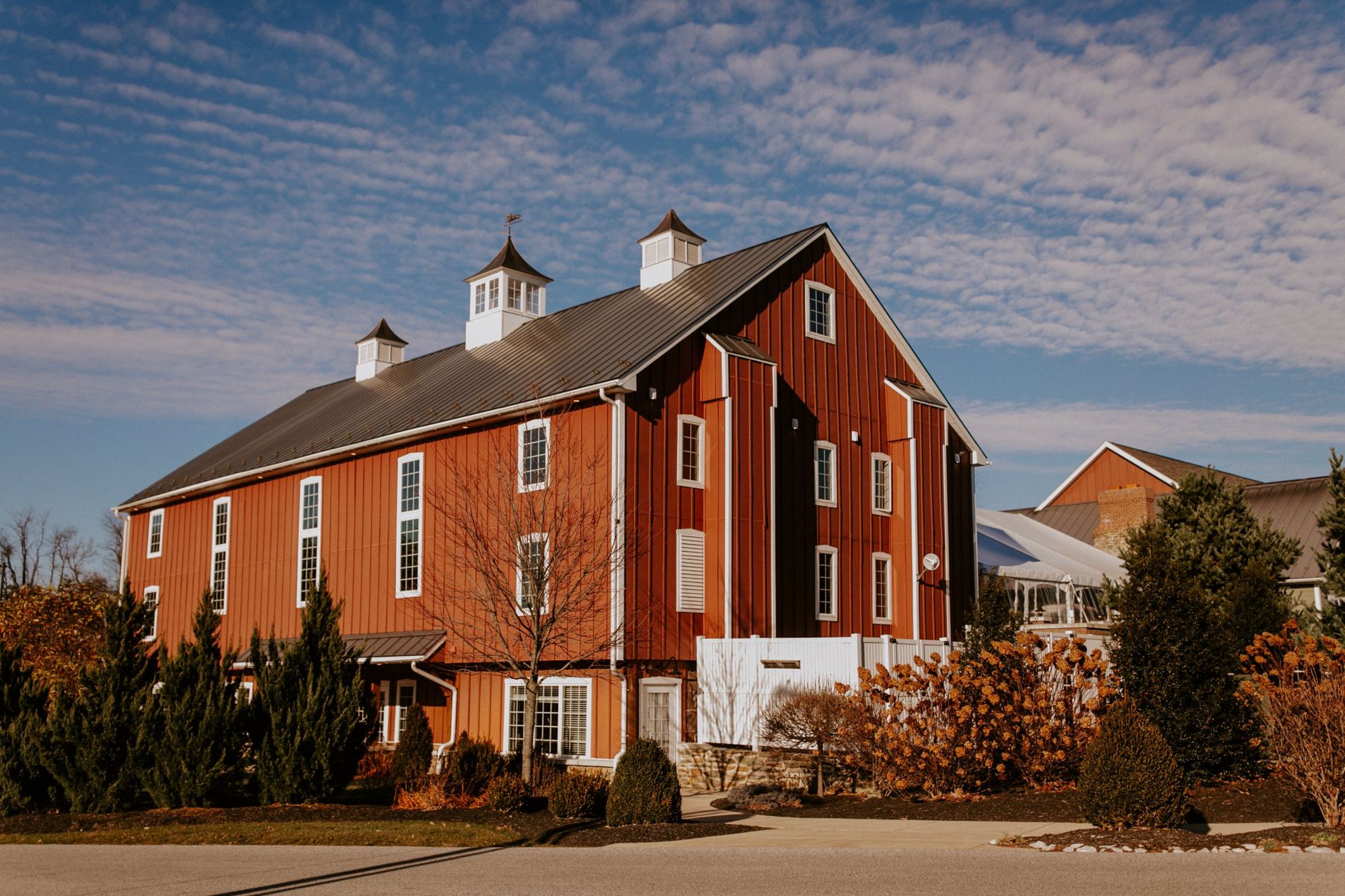 The red barn at Wyndridge Farm in autumn light