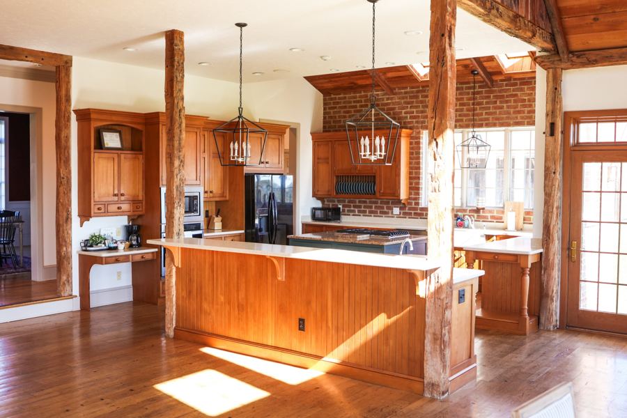 The Inn kitchen with timber posts and brick wall
