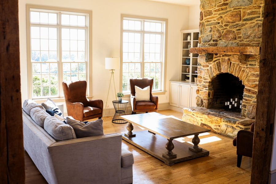 The Inn living room with stone fireplace